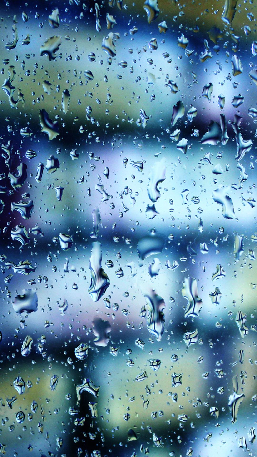 雨滴落在玻璃上的唯美手机壁纸图片